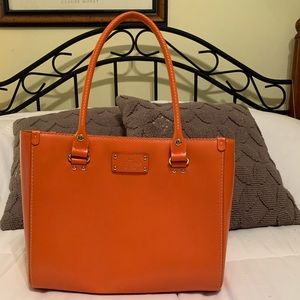 Barely used Kate Spade Leather Medium sized Tote with embossed Tag .